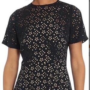 Navy dress. Short sleeve. Knee length.